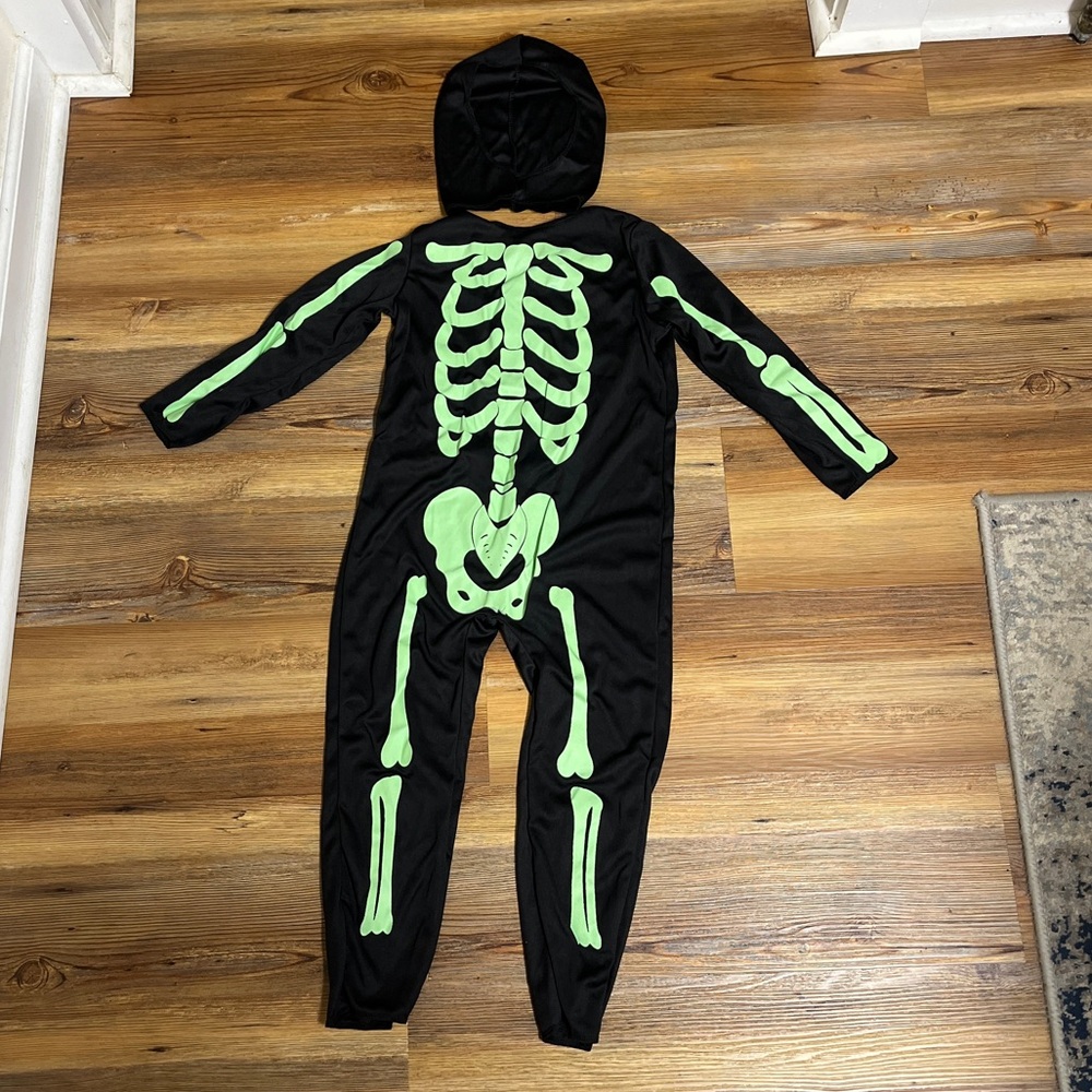 Skeleton costume, NIP, glows in dark, 3-4 years, 100% polyester, hood, unisex